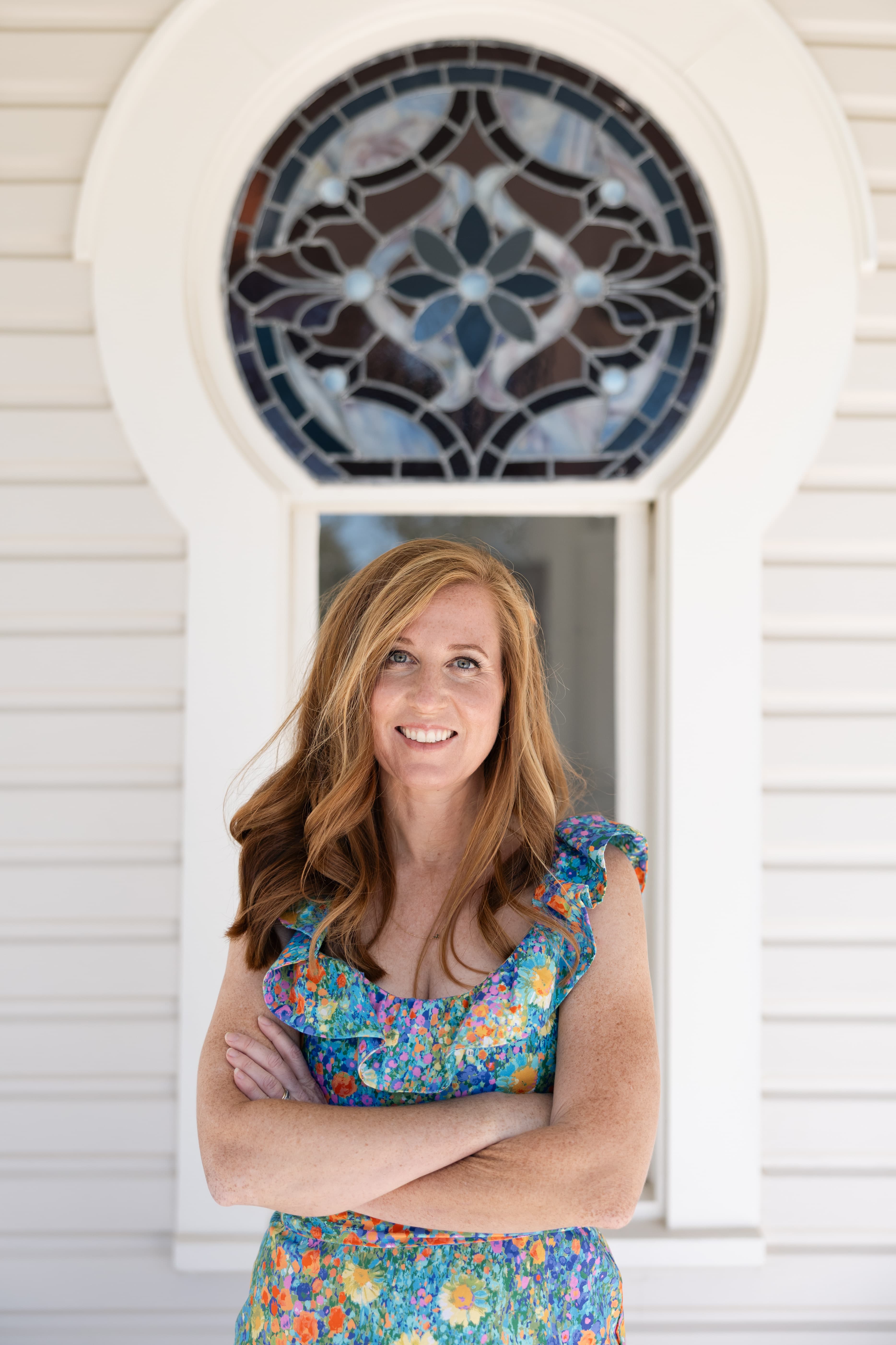 Katie standing confidently at her wedding venue